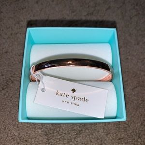 Kate Spade “Stop and smell the roses” bangle.